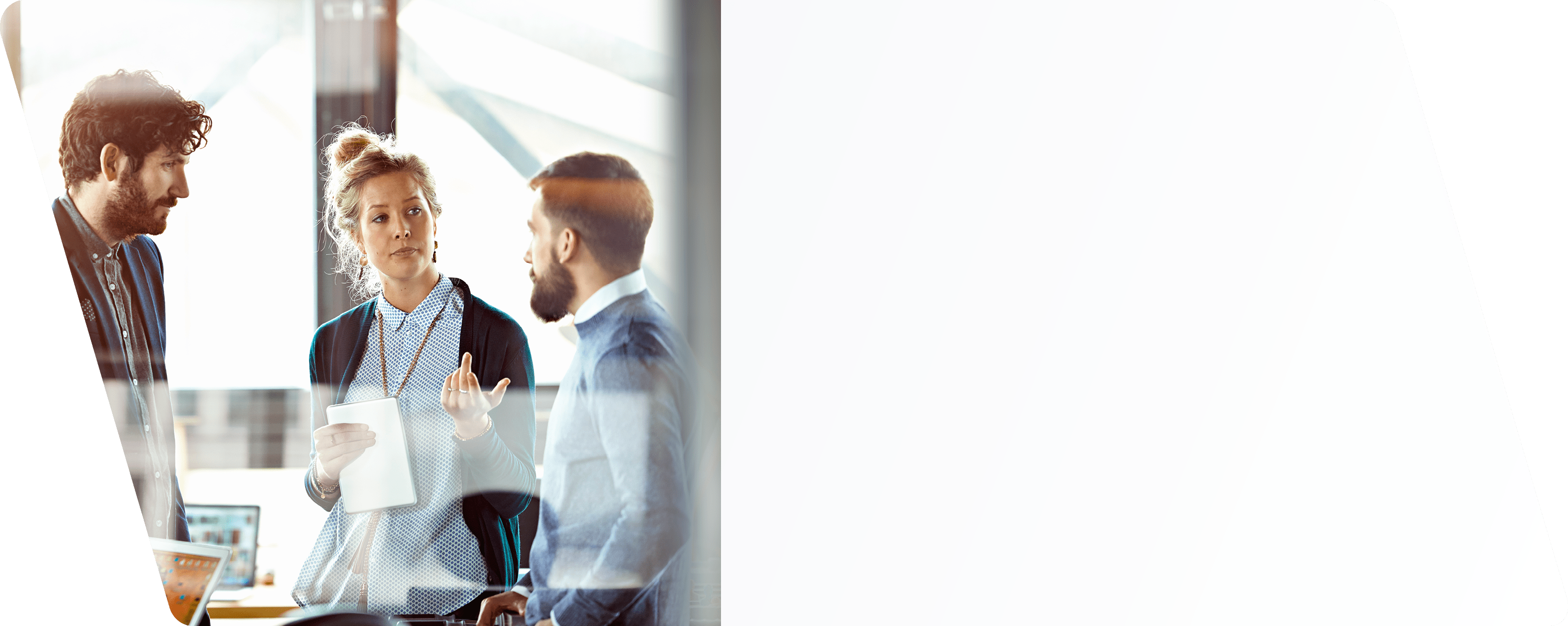 Men and women talking in modern office