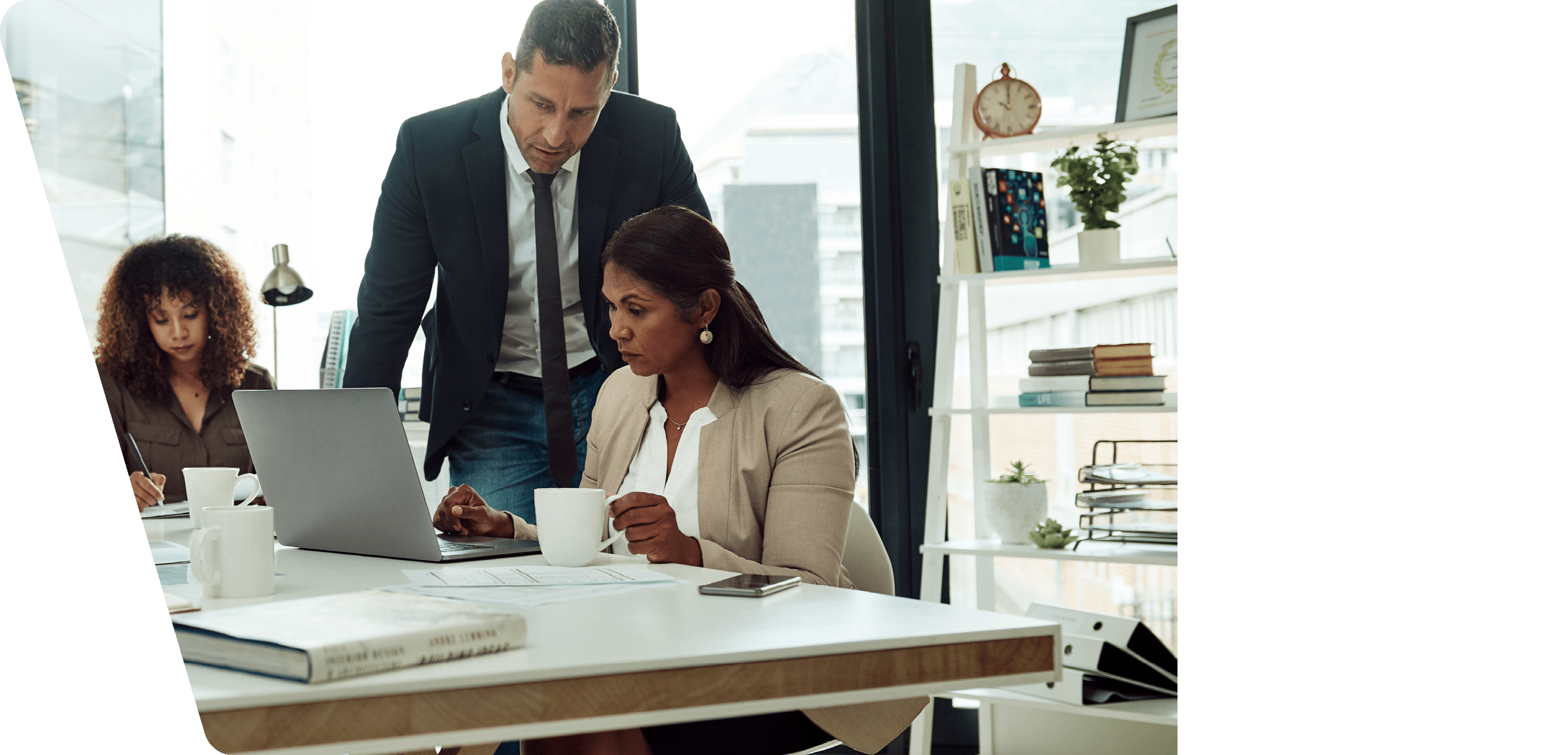 Shot of a group of businesspeople working together in an office