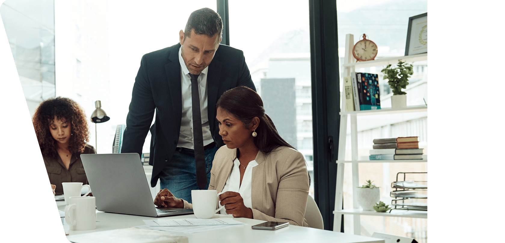 Shot of a group of businesspeople working together in an office